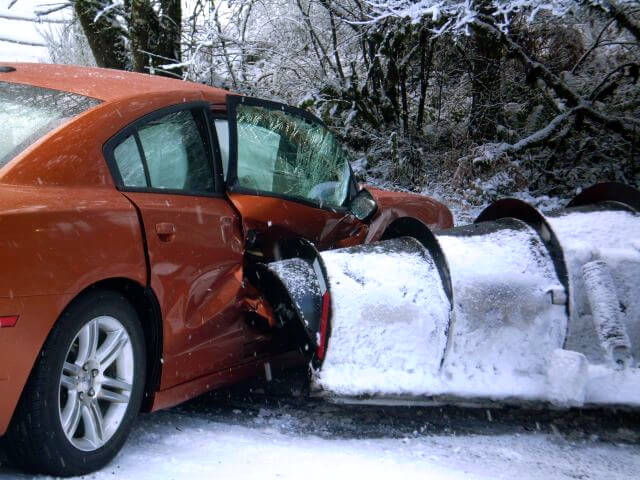 Snow Plow Damage to Car